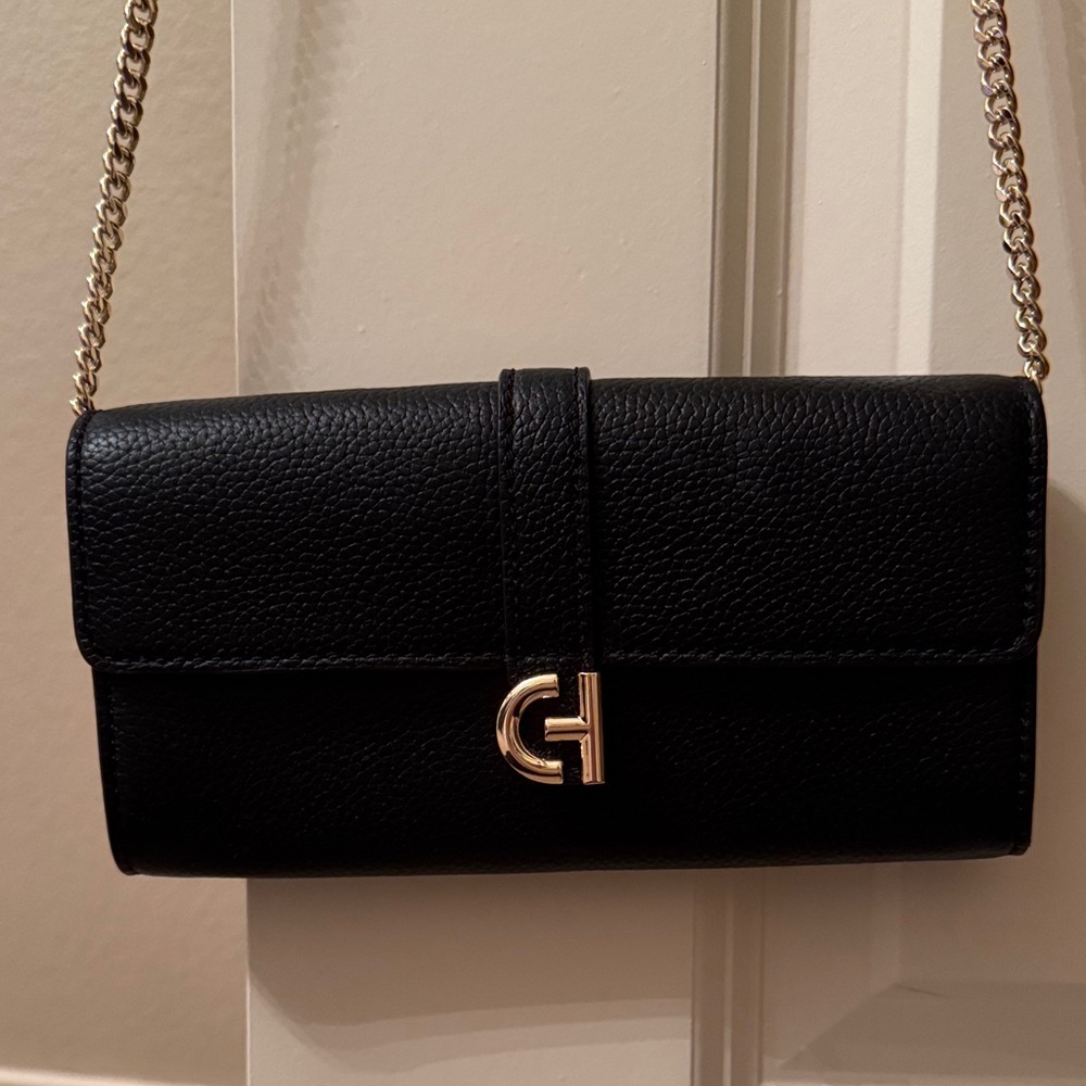 Cole Haan Black Leather Shoulder clutch bag
Buy for Christmas and I’ll wrap it